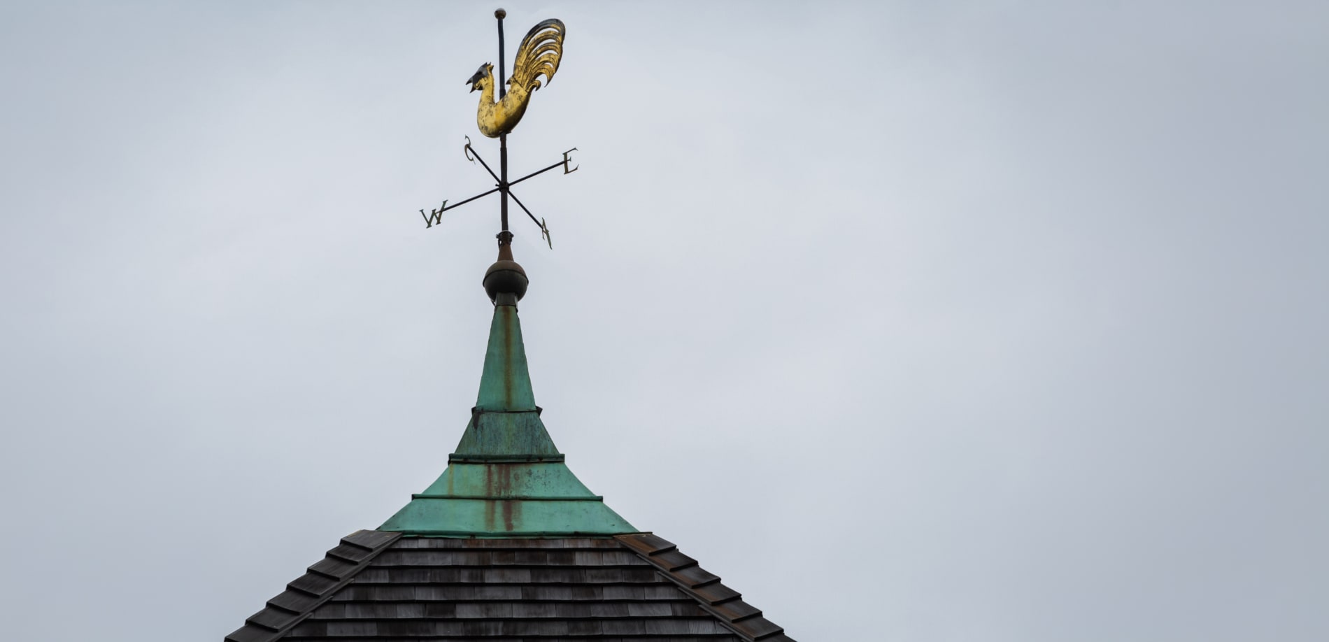 Tower with a rooster weathervane